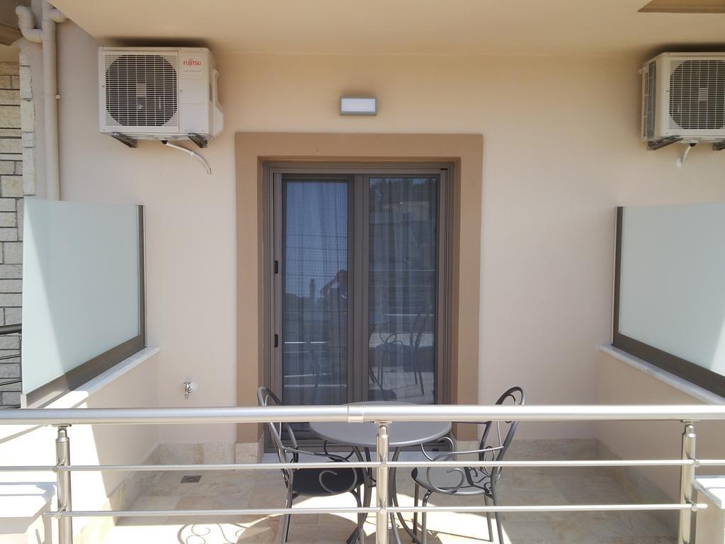 Aktaia Boutique Hotel Ammoudia Habitación foto